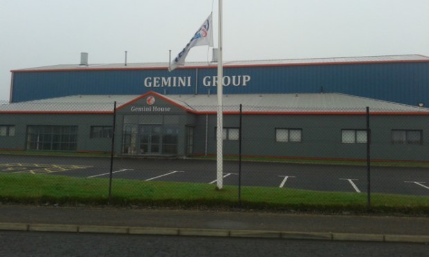 A flag at half mast over the company's Brent Avenue site.