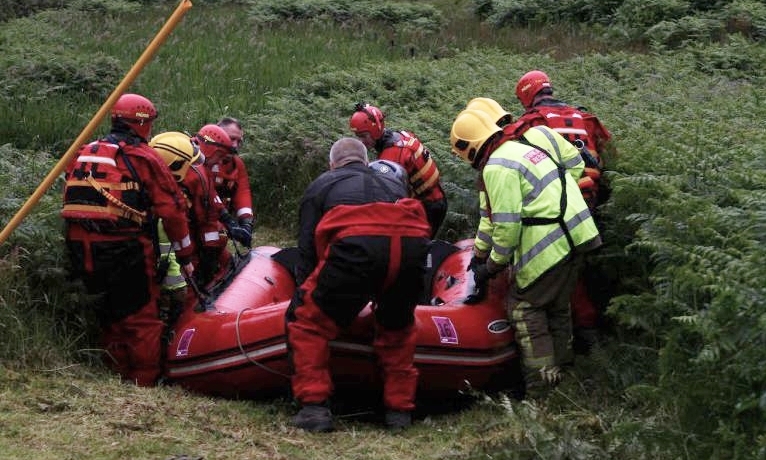 Firefighters helped in the rescue attempt.