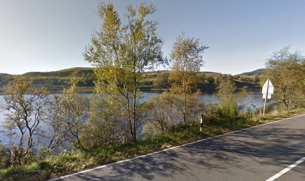 The road runs alongside Loch nan Druimnean.