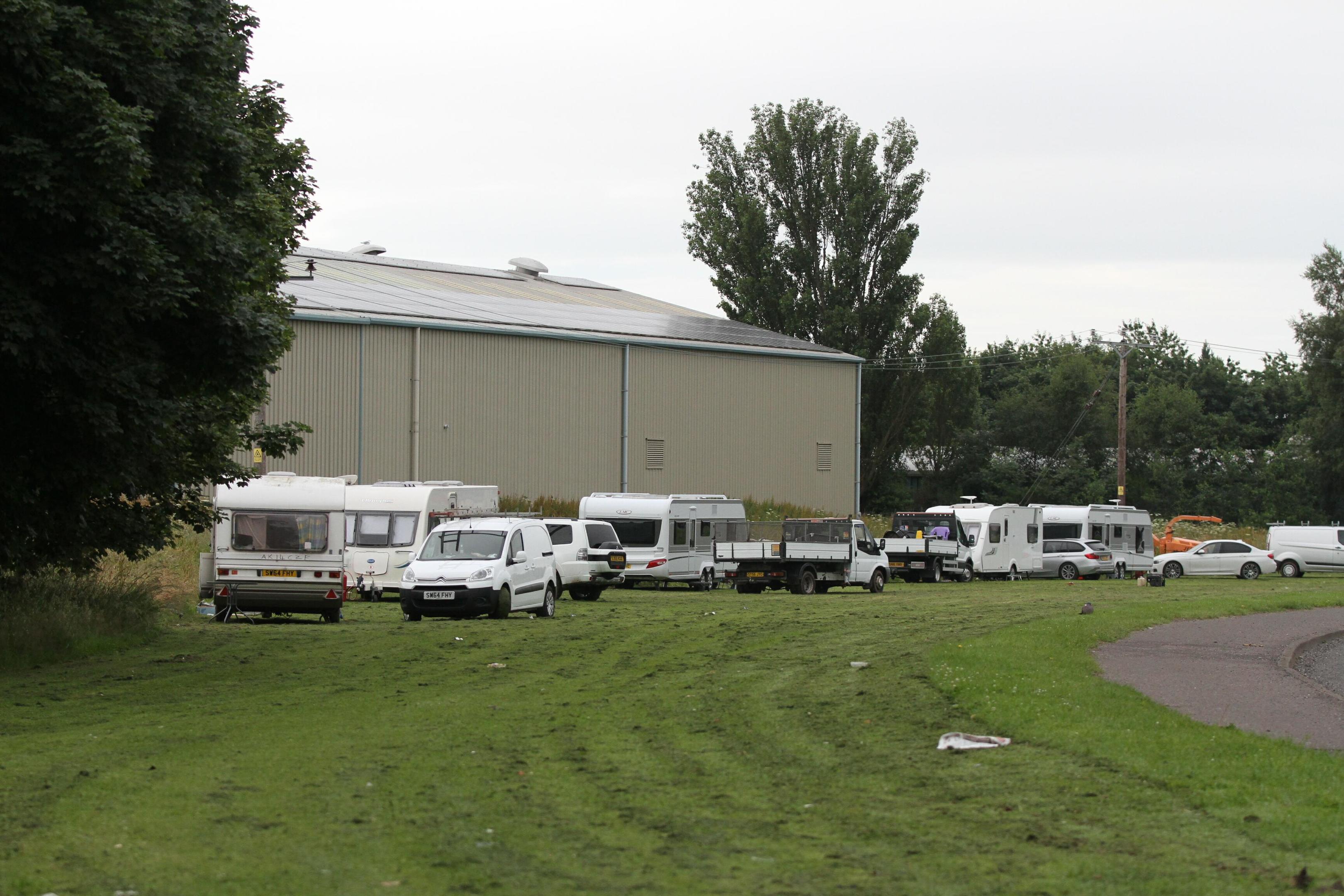 Travellers camped on ground close to West Pitkerro Industrial Estate