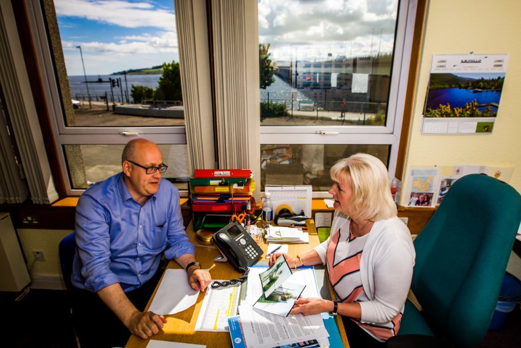 Alan Hutchison and Fiona Fraser go through some of the archives on the bridge