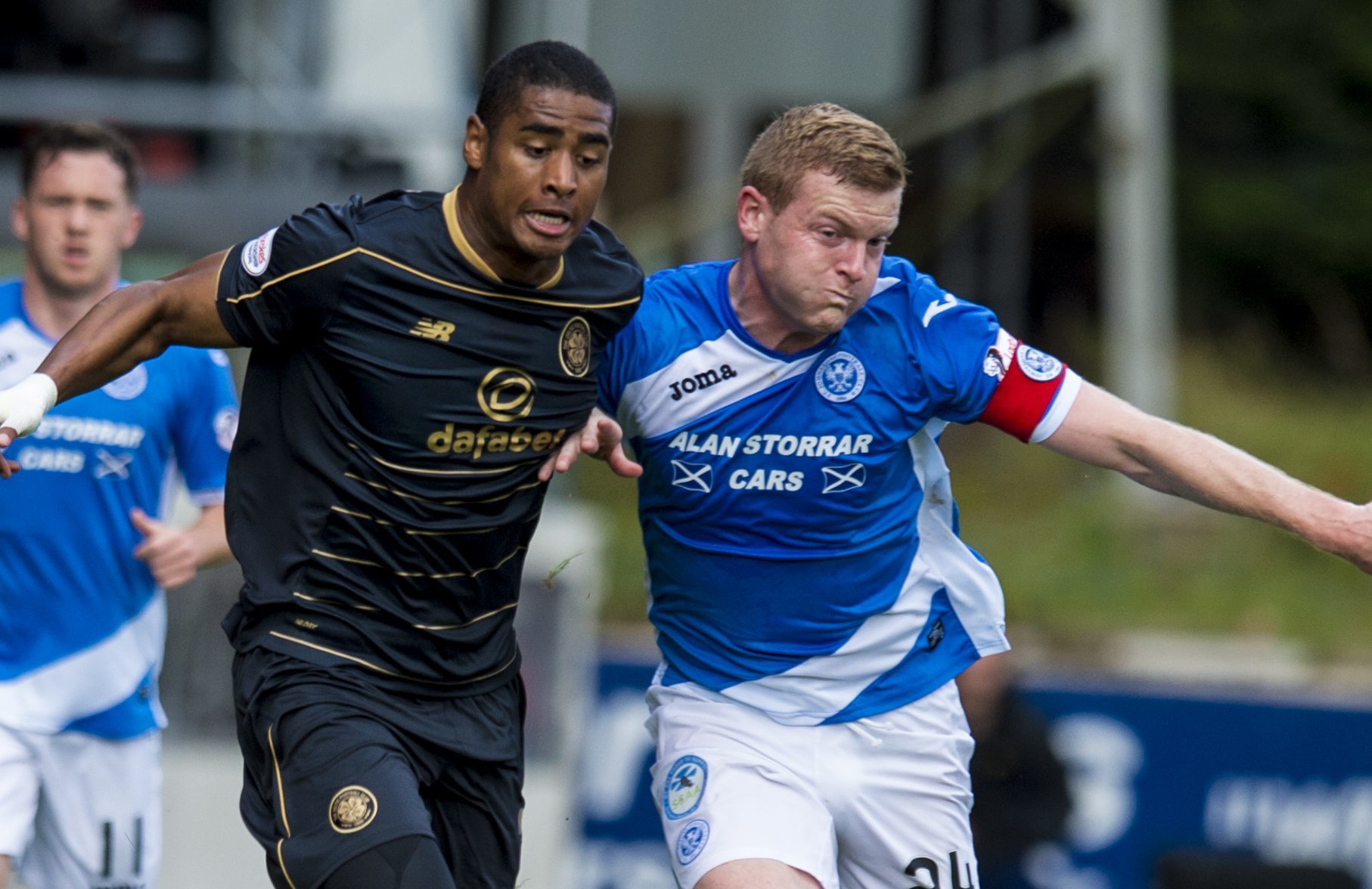 Brian Easton battles for possession with Siady Janko.