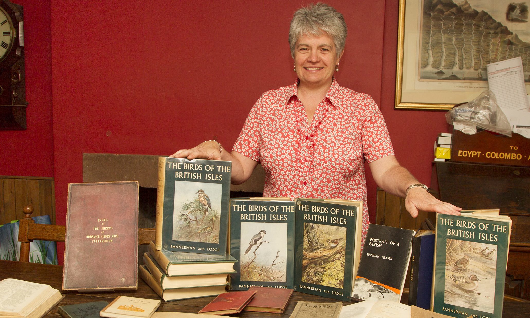 Organiser Hilary Farquharson with some of the old works.