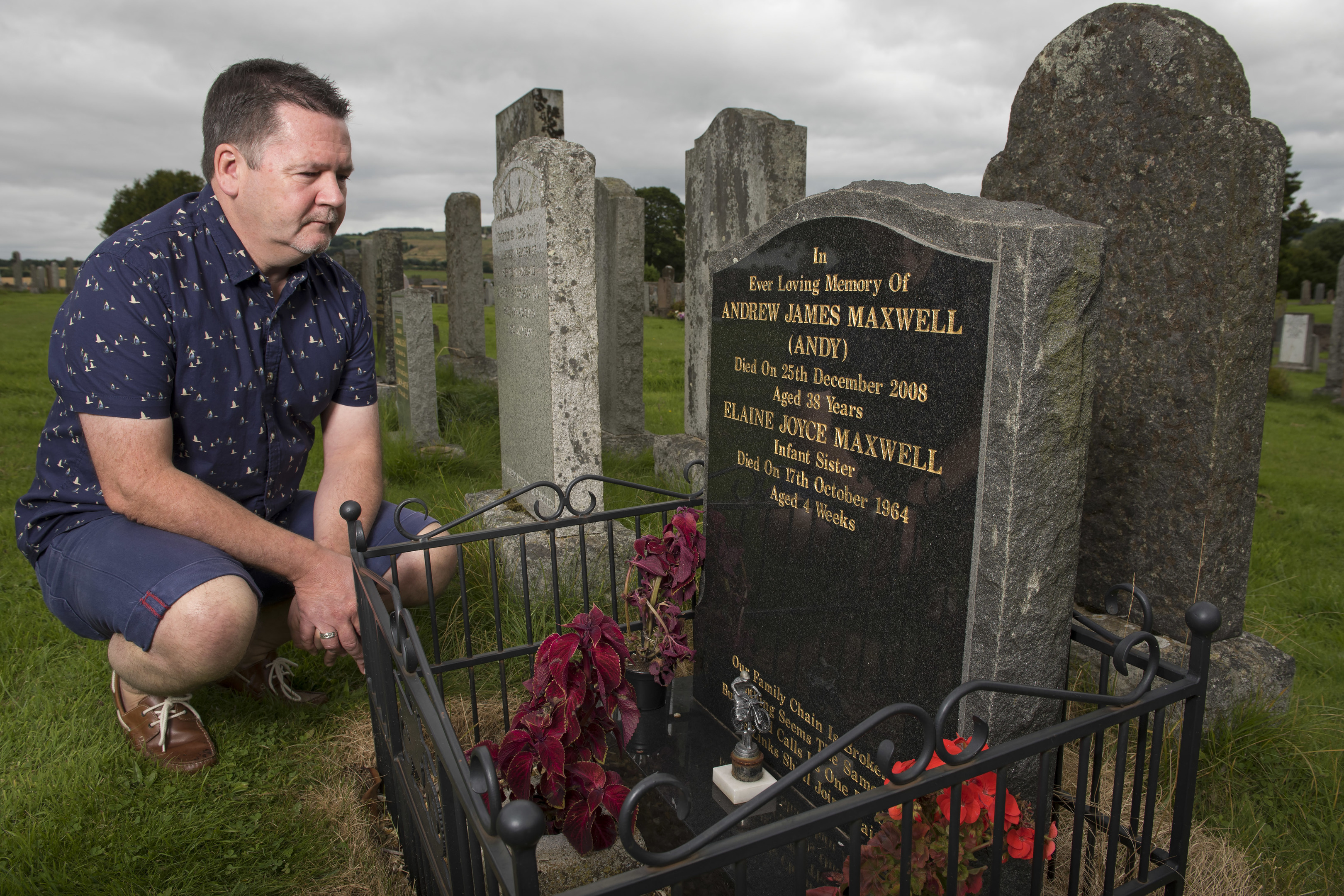 Roddy Maxwell at the grave of his brother Andy.