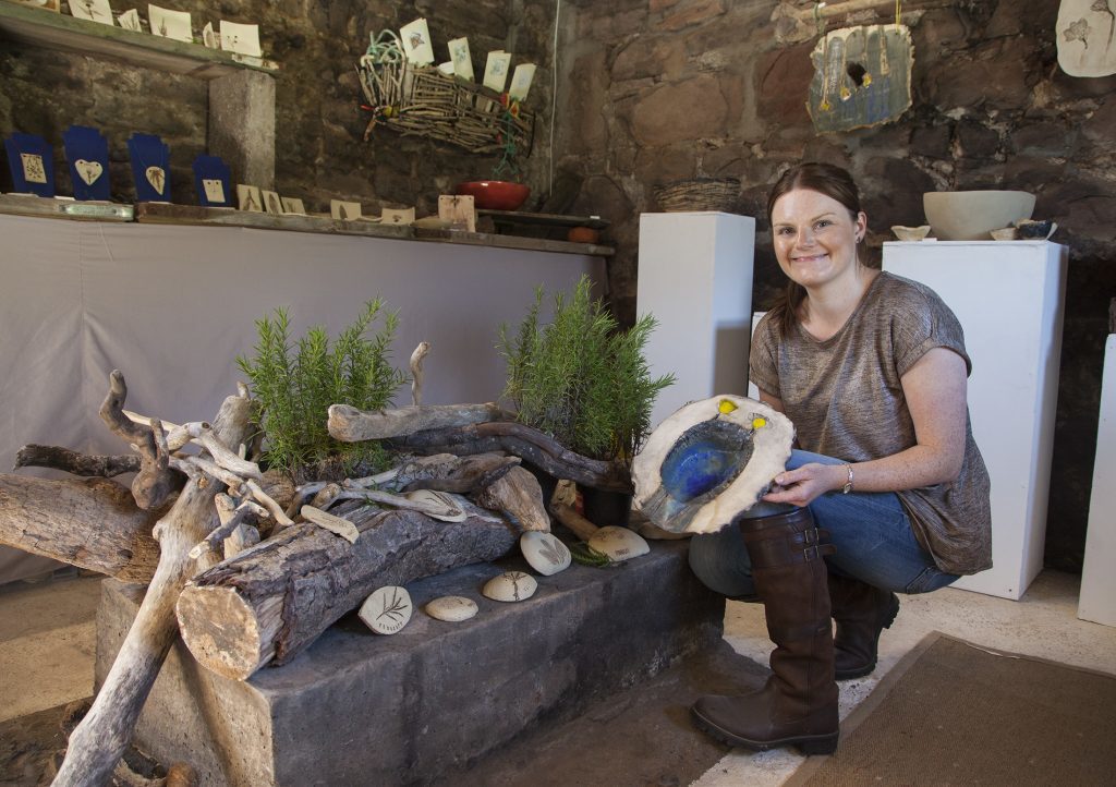 Jennifer Nicoll of Rockpools and Daffodils with some of her ceramics on display.