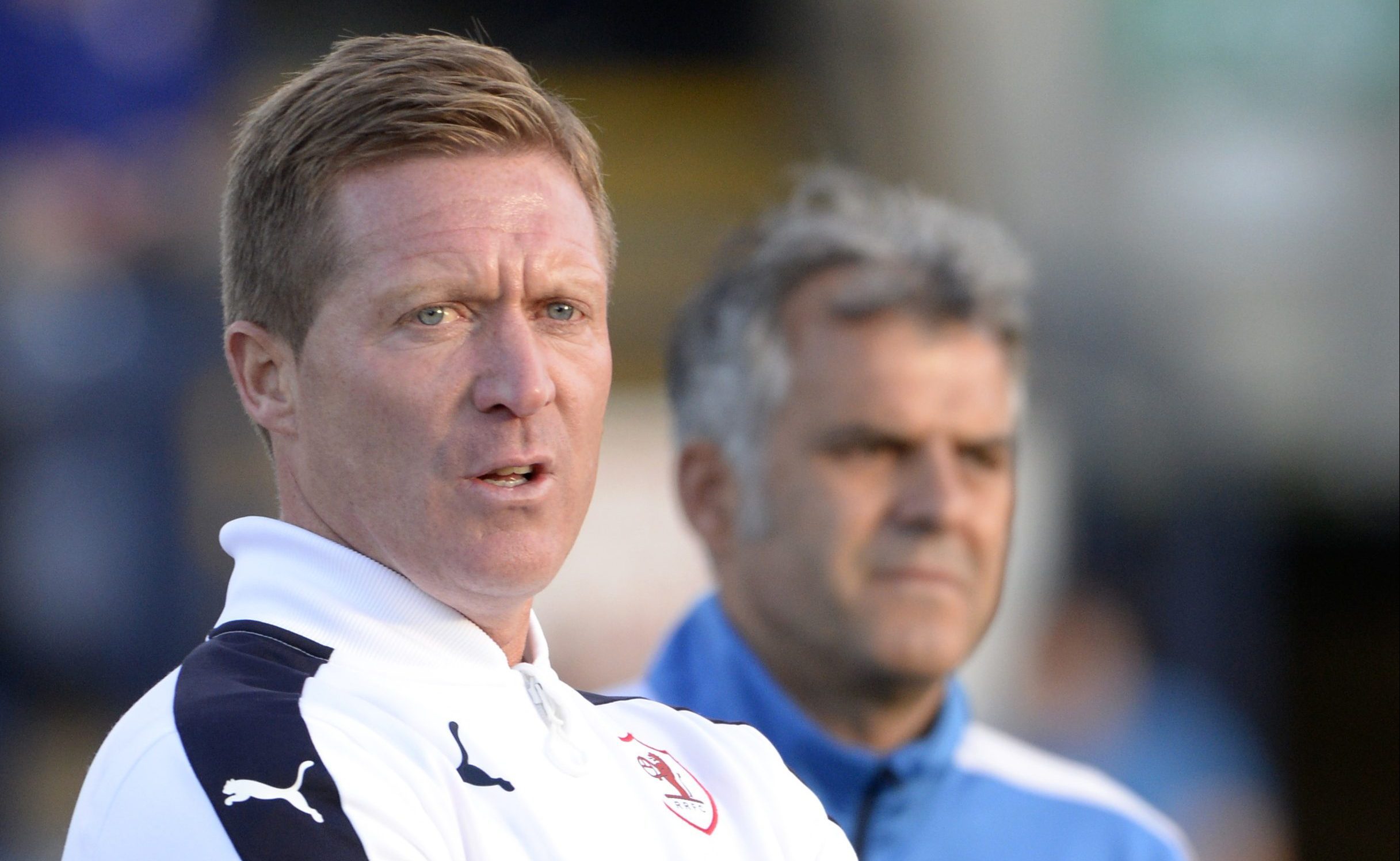 Gary Locke, left, and assistant Darren Jackson.