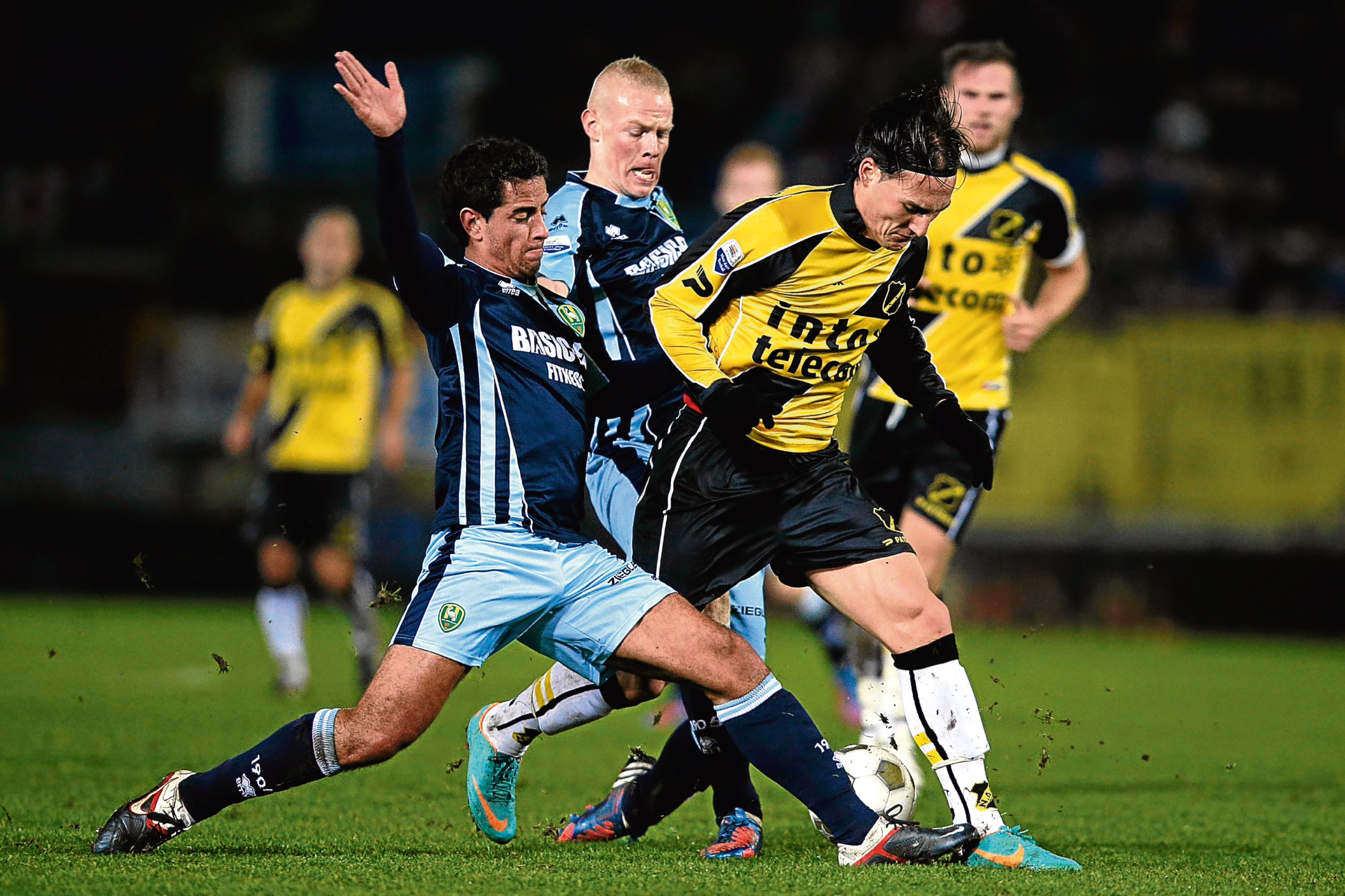 Christian Supusepa
BREDA, NETHERLANDS - NOVEMBER 23:  Nemanja Gudelj of NAC and Tom Beugelsdijk and Christian Supusepa of Den Haag battle for the ball during the Eredivisie match between NAC Breda and ADO Den Haag at the Rat Verlegh Stadium on November 23, 2012 in Breda, Netherlands.  (Photo by Dean Mouhtaropoulos/Getty Images)