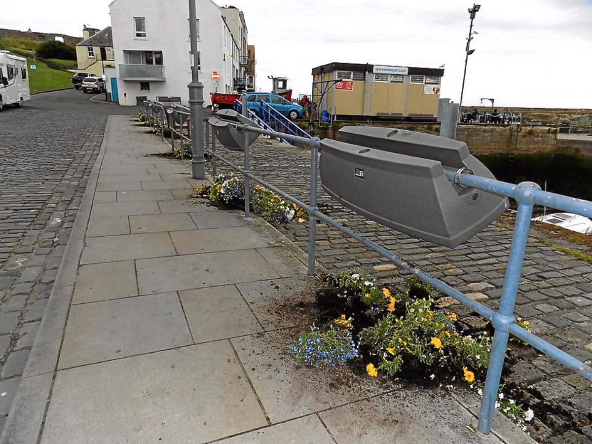 The toppled planters.