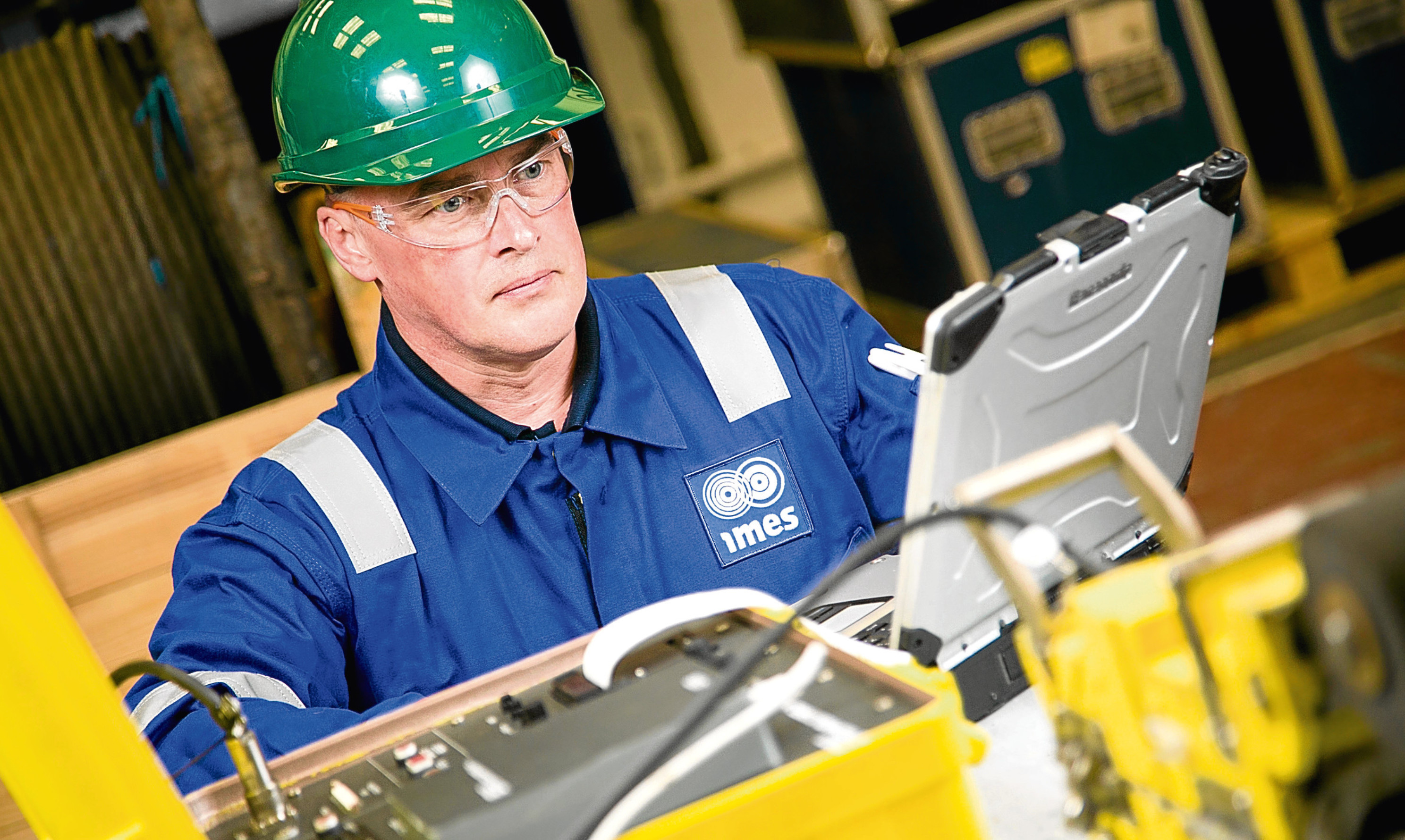 A technician carries out an equipment inspection at IMES Rosyth