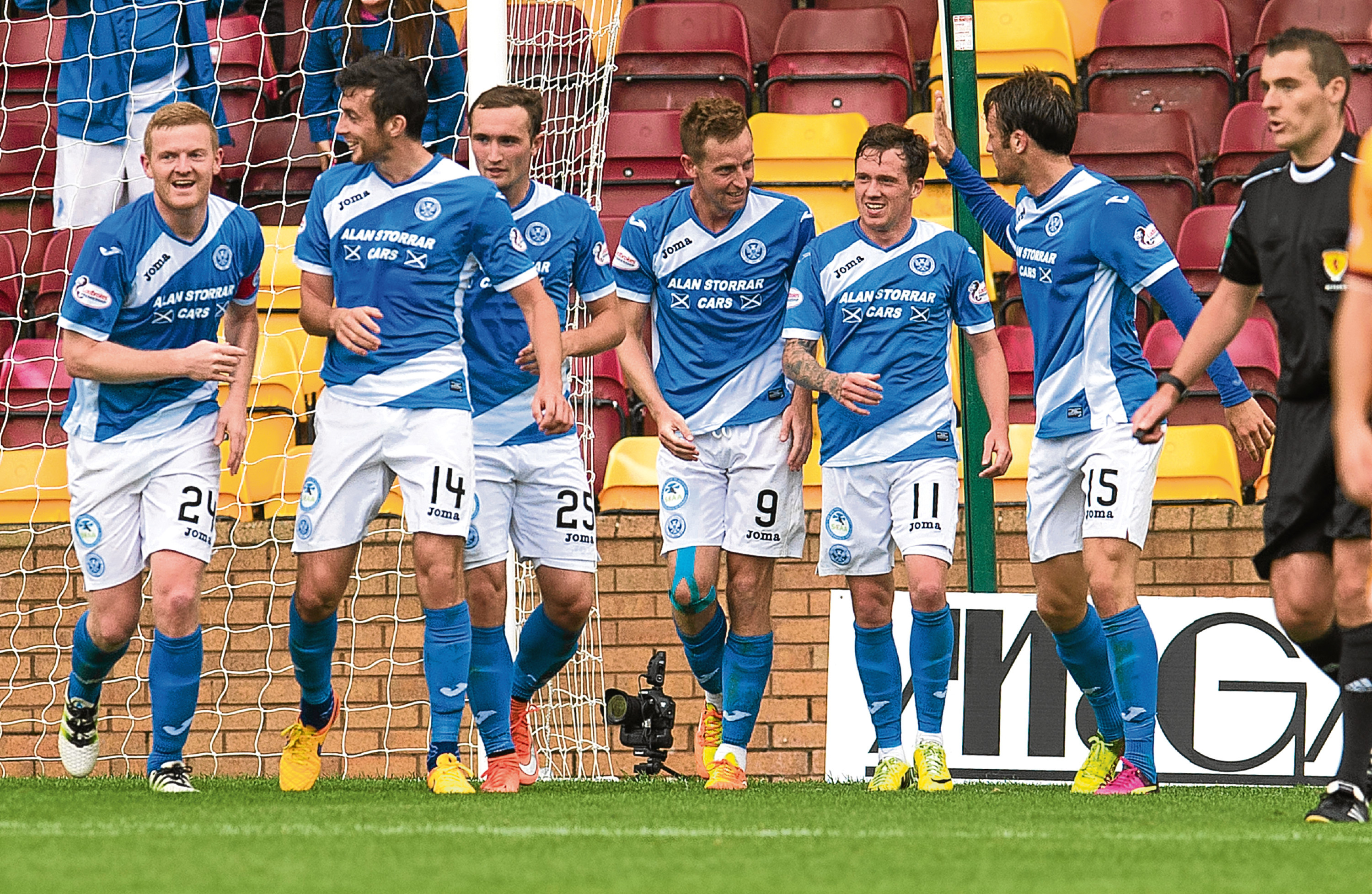 St Johnstone's Steven Maclean (centre) celebrates his goal with his team-mates.