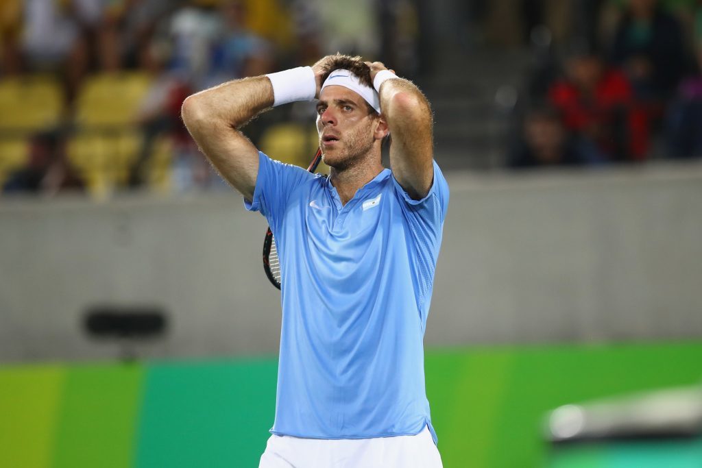 Juan Martin Del Potro of Argentina reacts after defeat.