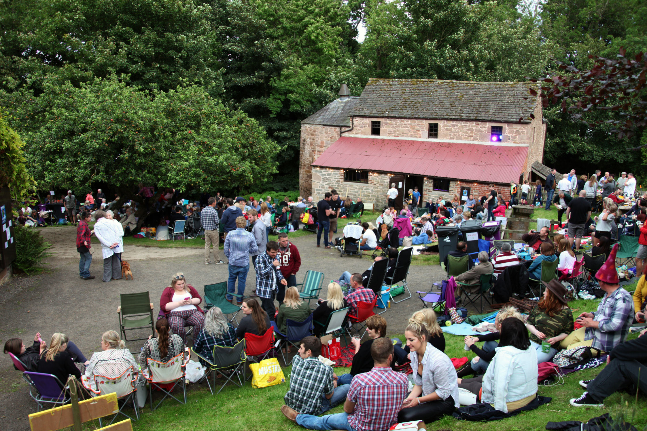 Crowds enjoy the entertainment at a previous Music at the Mill event