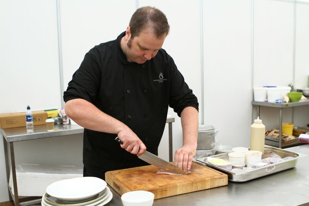 Eden Sinclair 'prepping up' before his cookery demonstration.