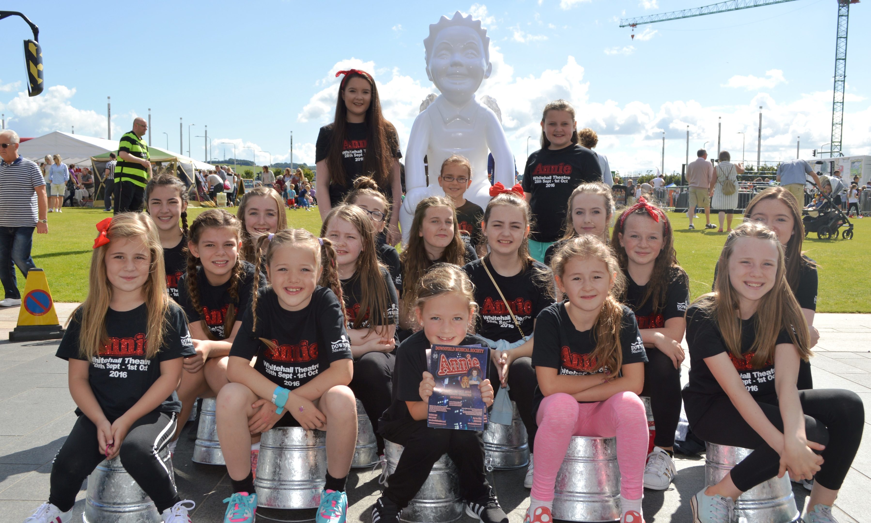 Youngsters with one of the Oor Wullie Bucket Trail statues at Slessor Gardens.
