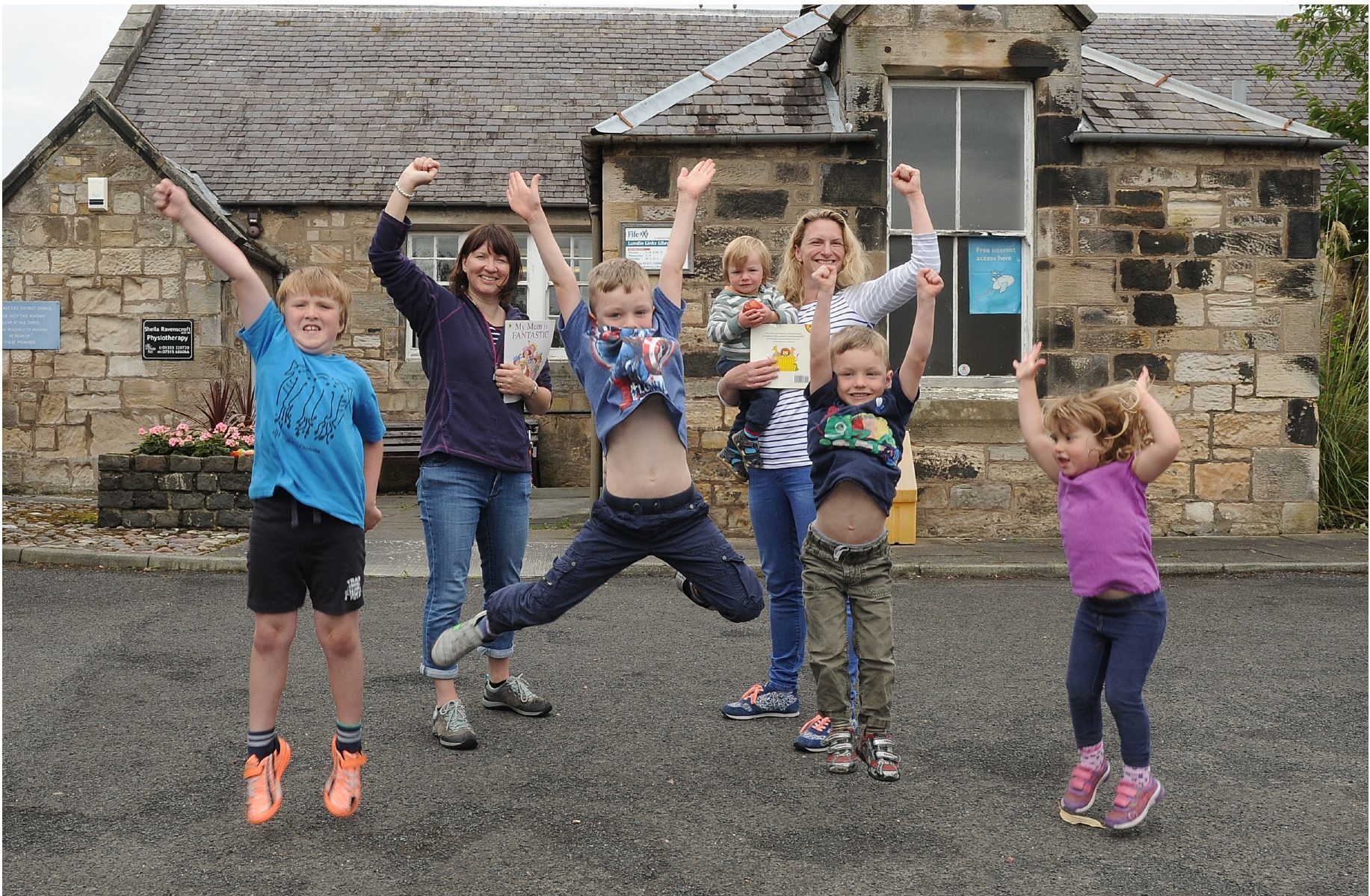 Celebrating at Lundin Links Library are children Murray, 7, Archie, 6, Innes, 4, and Emma, 3, with Heather Paterson and Emily Macdonald with Ruari, 1.