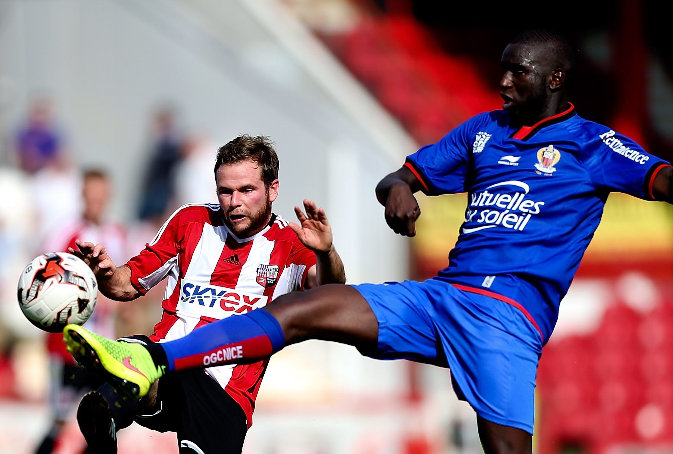 Kevin Gomis in action for Nice against Brentford.