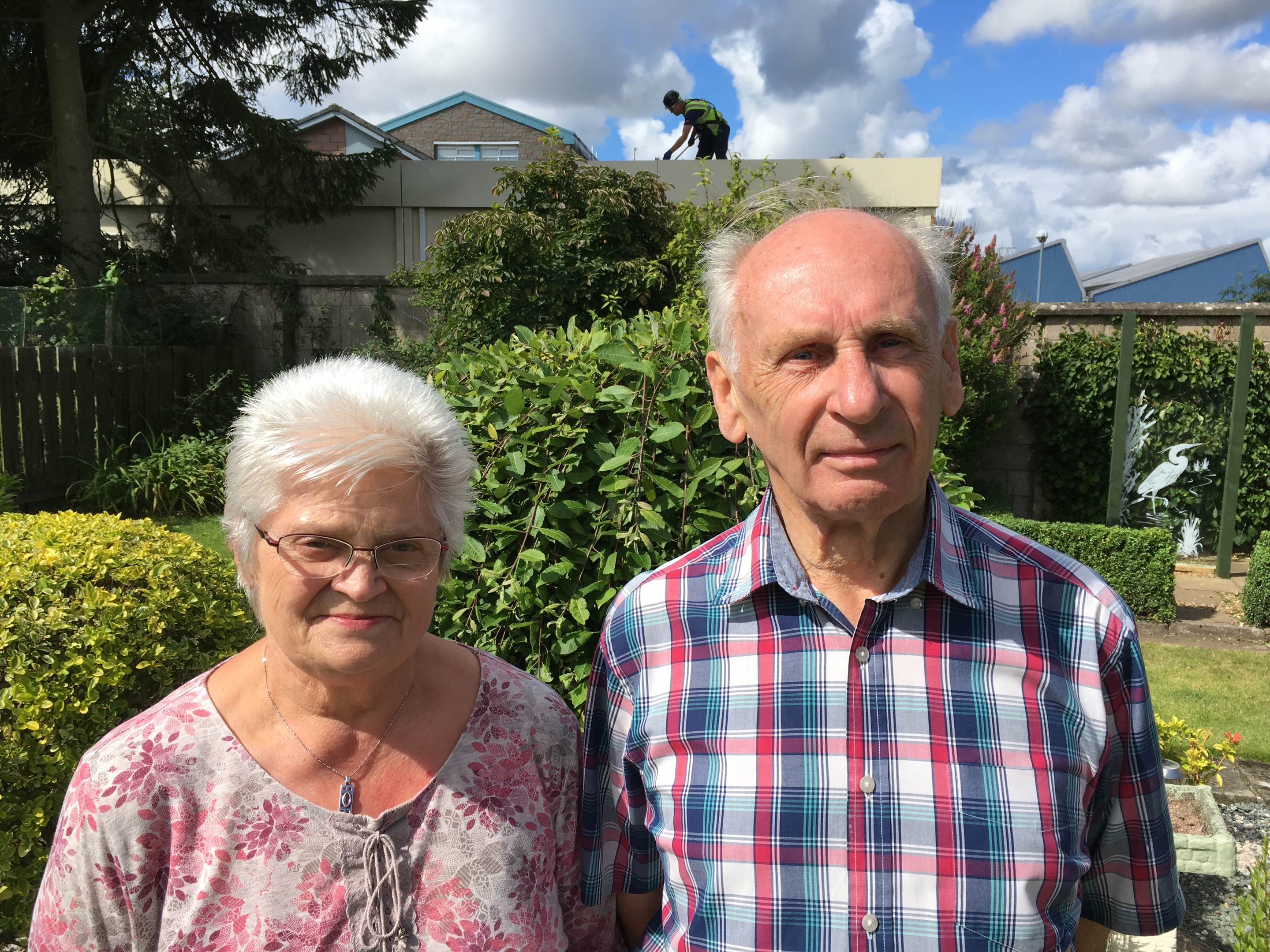 Hamish and Anne Mitchell of Johnston Avenue with the temporary classroom behind them.