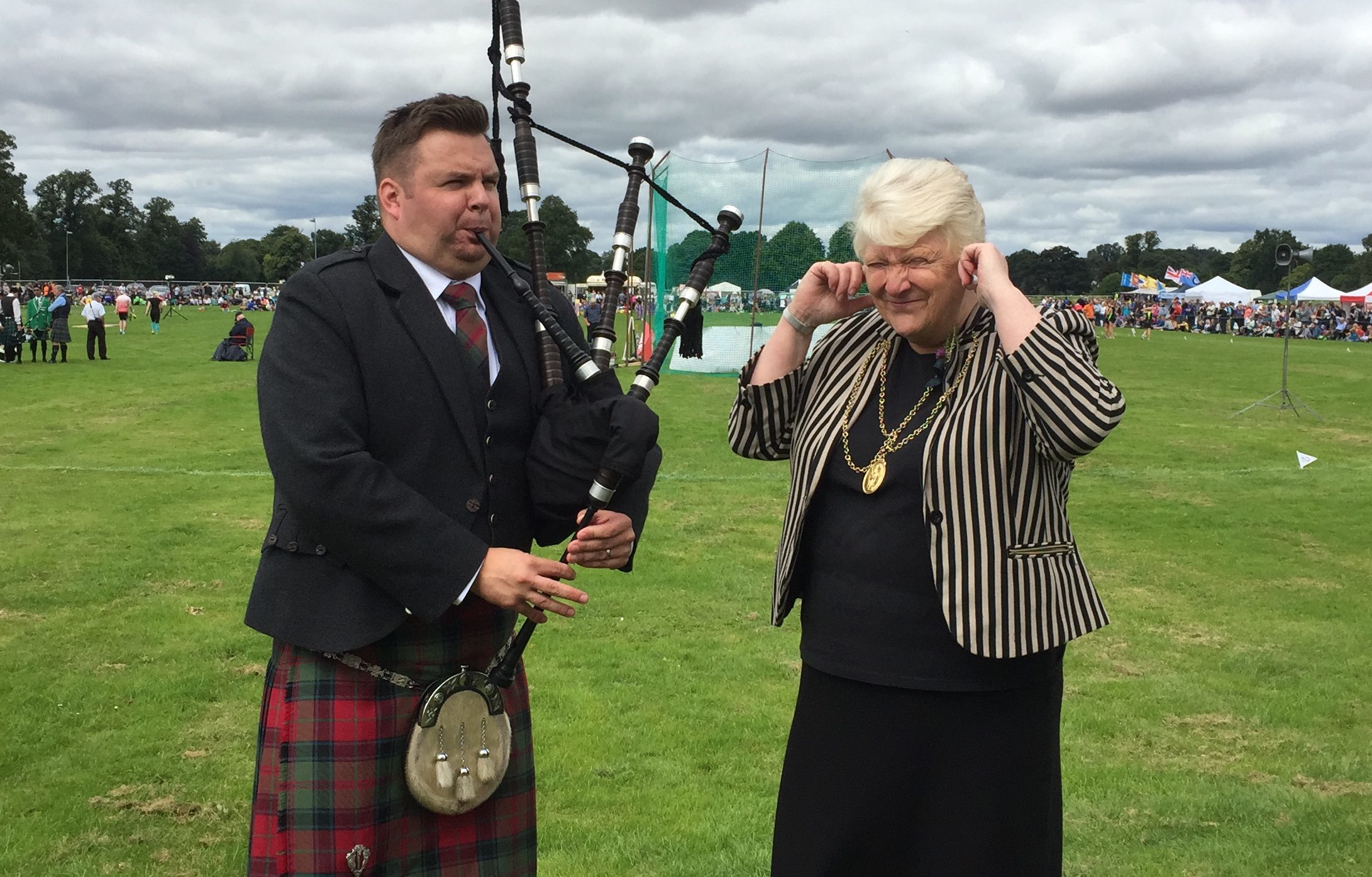 Stuart Cassells plays the pipes for Liz Grant.