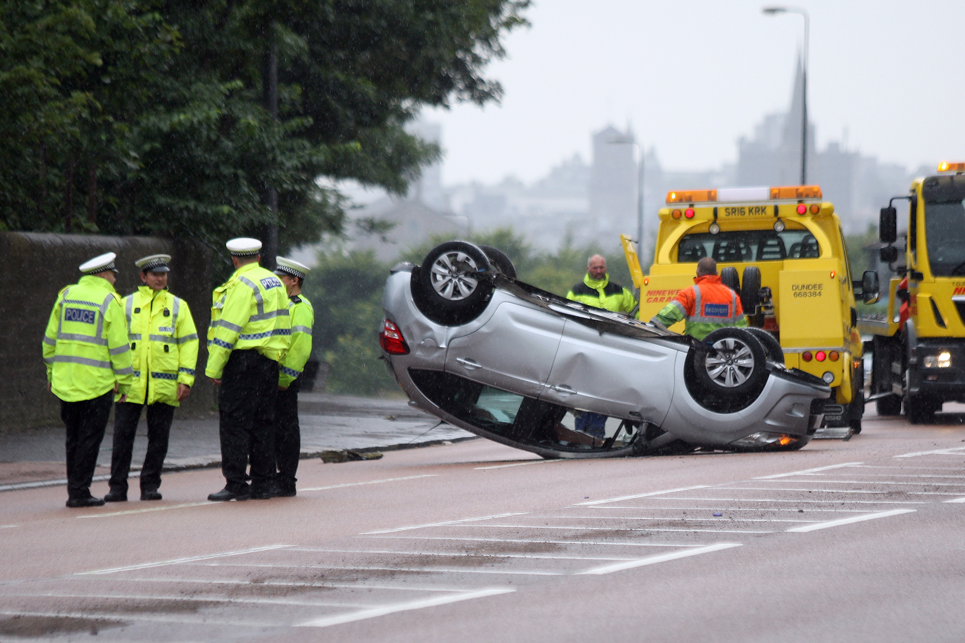 The overturned car.