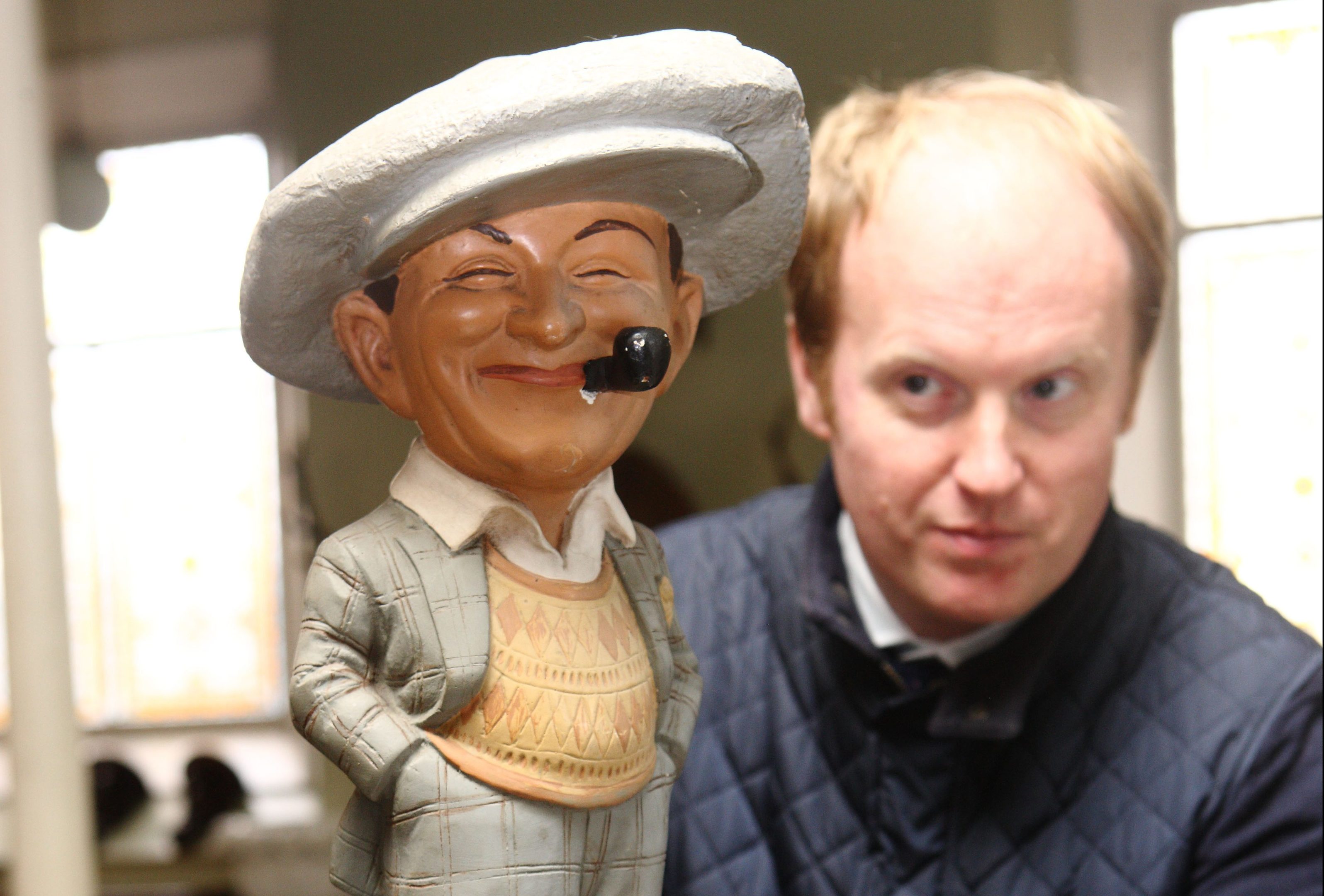 Nick Burns with an early 20th century  shop figure figurine.