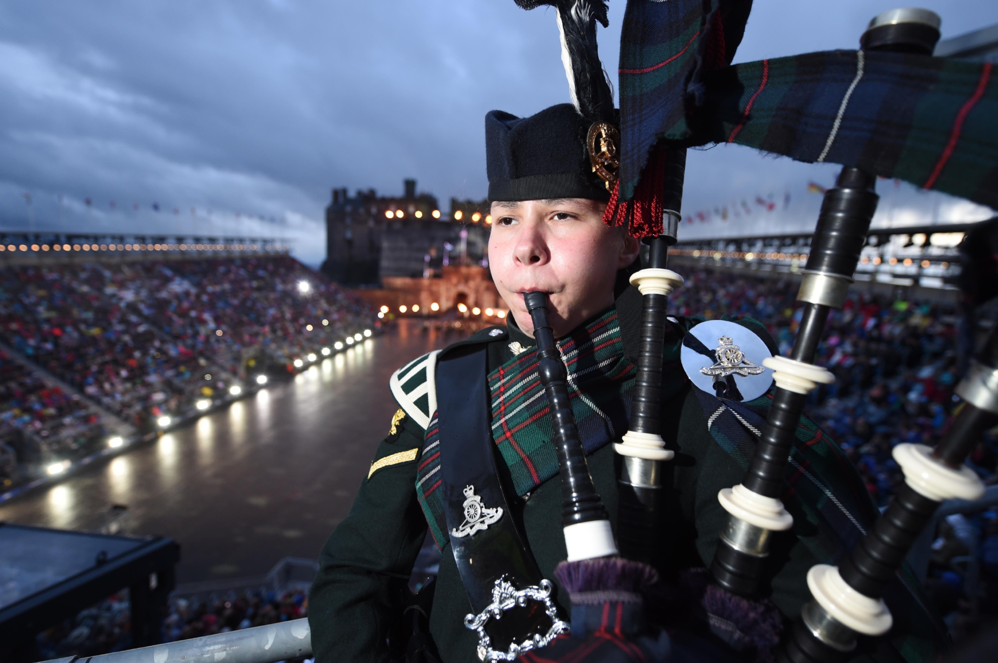 Lance Bombardier Megan Beveridge as the lone piper at the Royal Edinburgh Military Tattoo