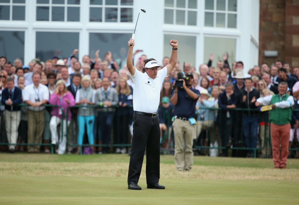 Archie has set his novel at Muirfield - Phil Mickelson of the United States reacts to a birdie putt on the 18th hole during the final round of the 142nd Open Championship at Muirfield on July 21, 2013.