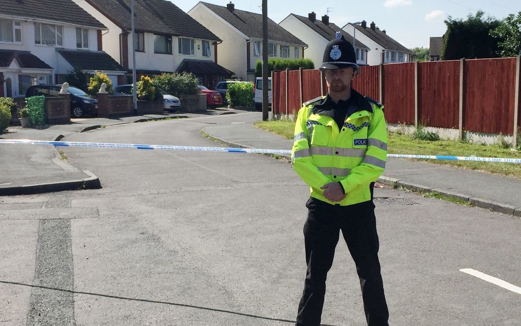 A policeman in the Trench area of Telford, where former Aston Villa footballer Dalian Atkinson died 