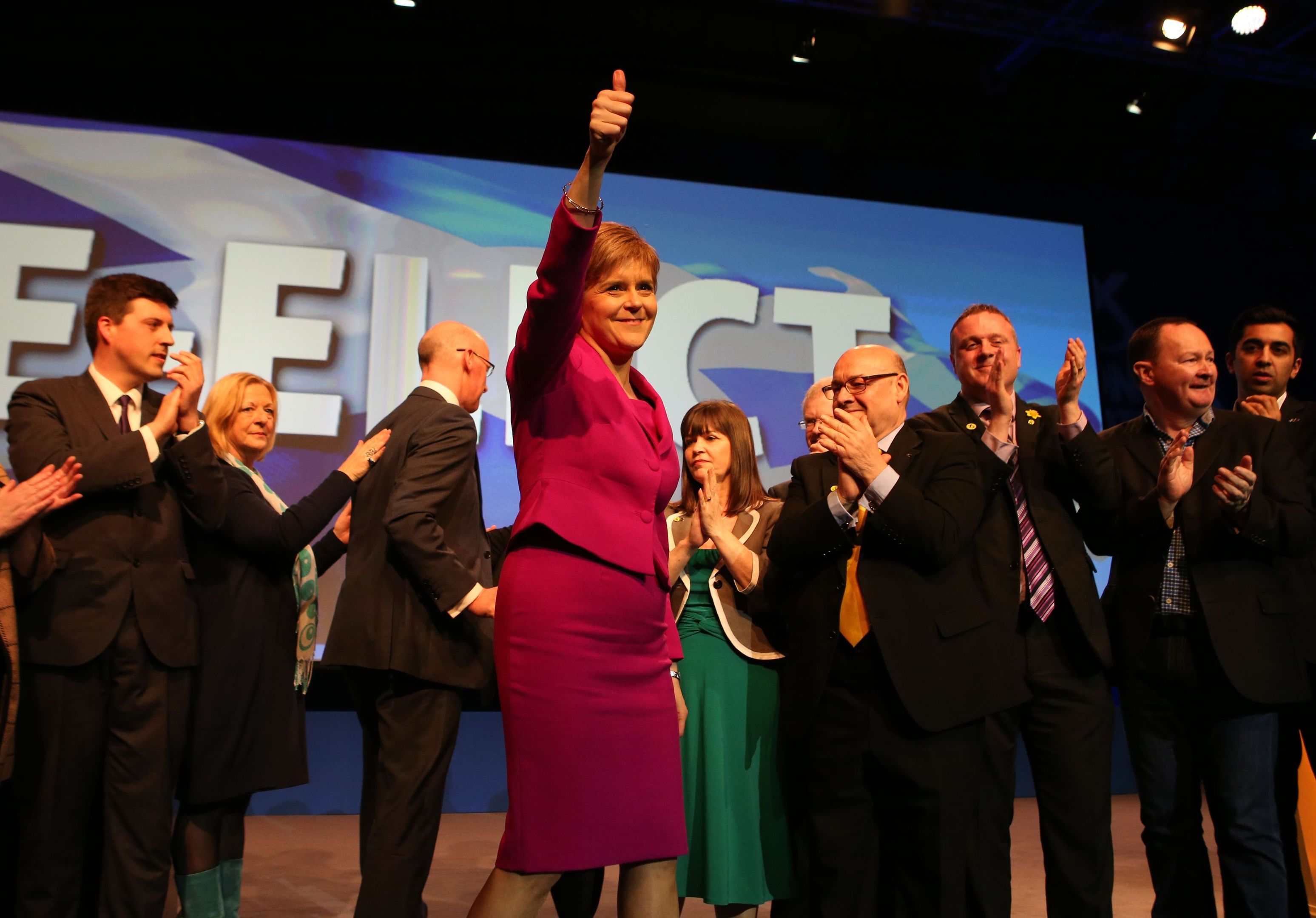 First Minister and SNP leader Nicola Sturgeon (centre) alongside SNP candidates at the end of the SNP spring conference at the SECC in Glasgow. 