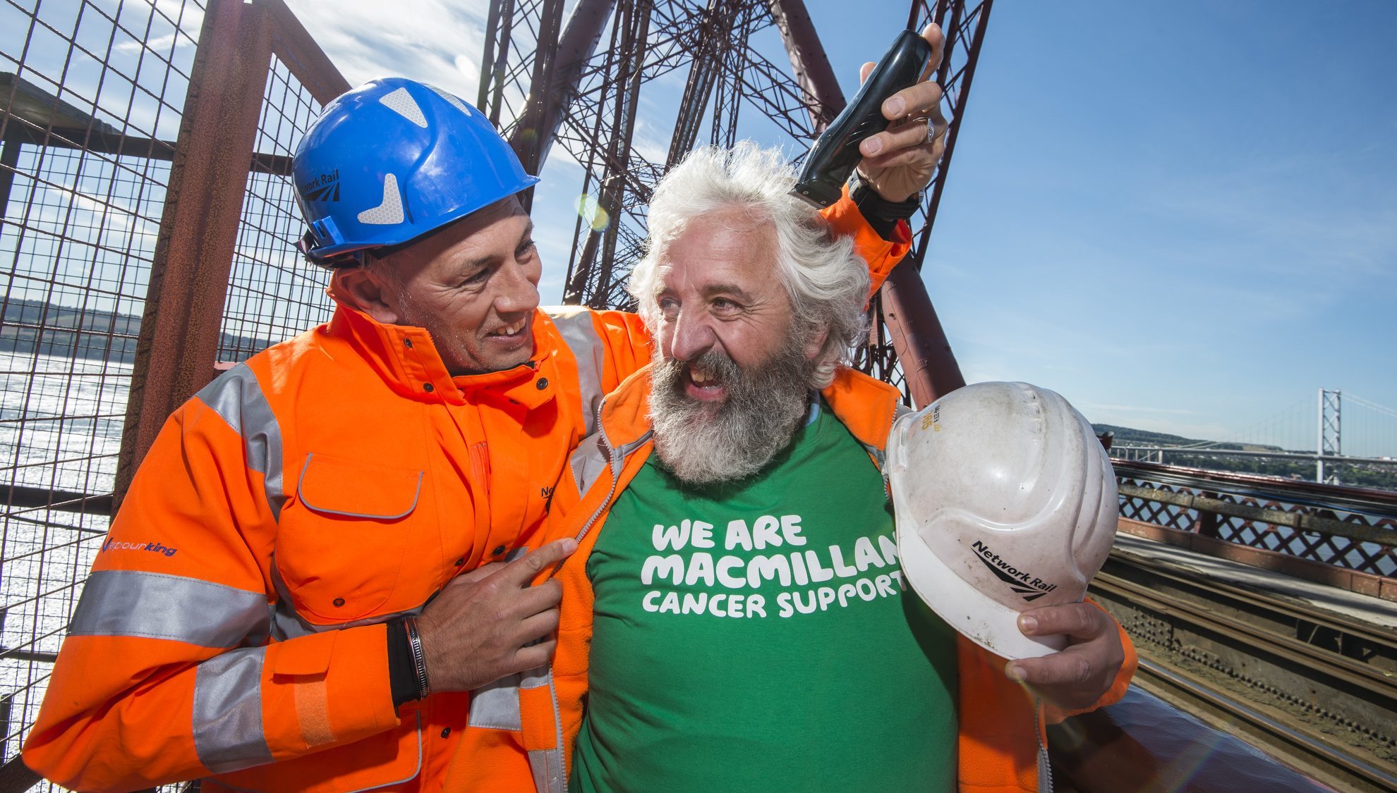 Network Rail employee Davie O'Donnell had a close shave with Rangers legend Mark Hateley on top of the Forth Rail Bridge.