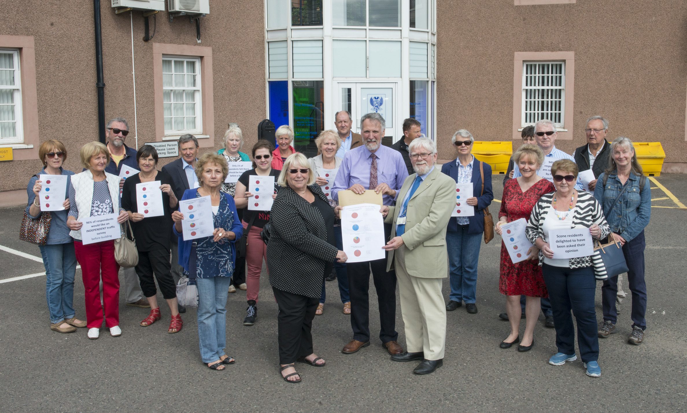 Scone housing protesters gather at Perth and Kinross Council HQ.