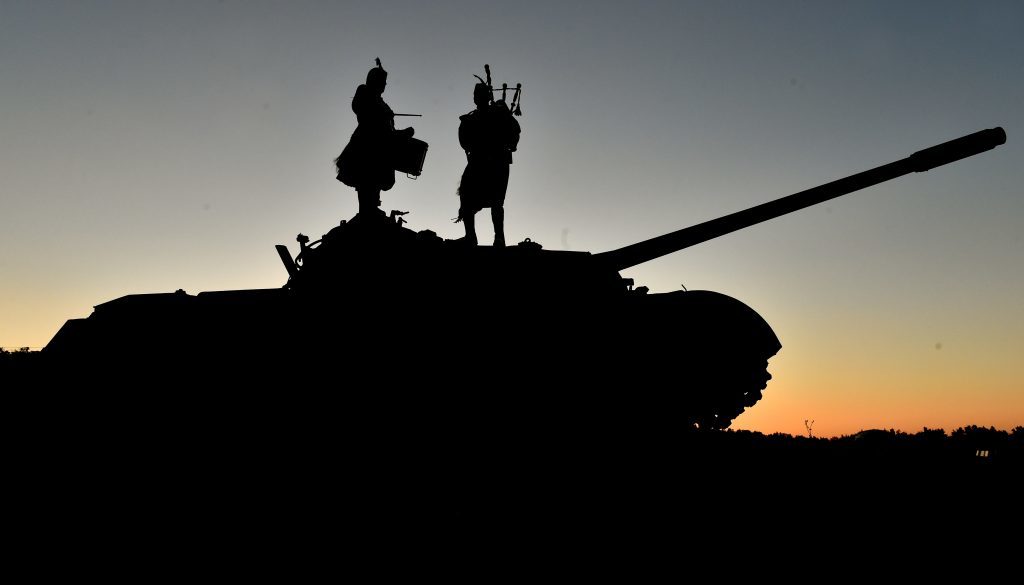 7 SCOTS piper Pte Keith Christie and drummer Lcpl David Hay on top of a former Soviet-built T72 tank at Red Earth military base in Croatia
