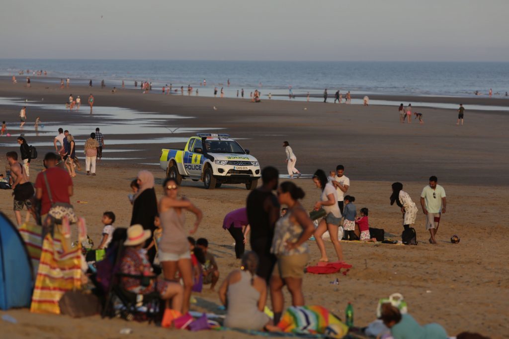 Two more bodies have been pulled from the sea and a sixth person is missing.