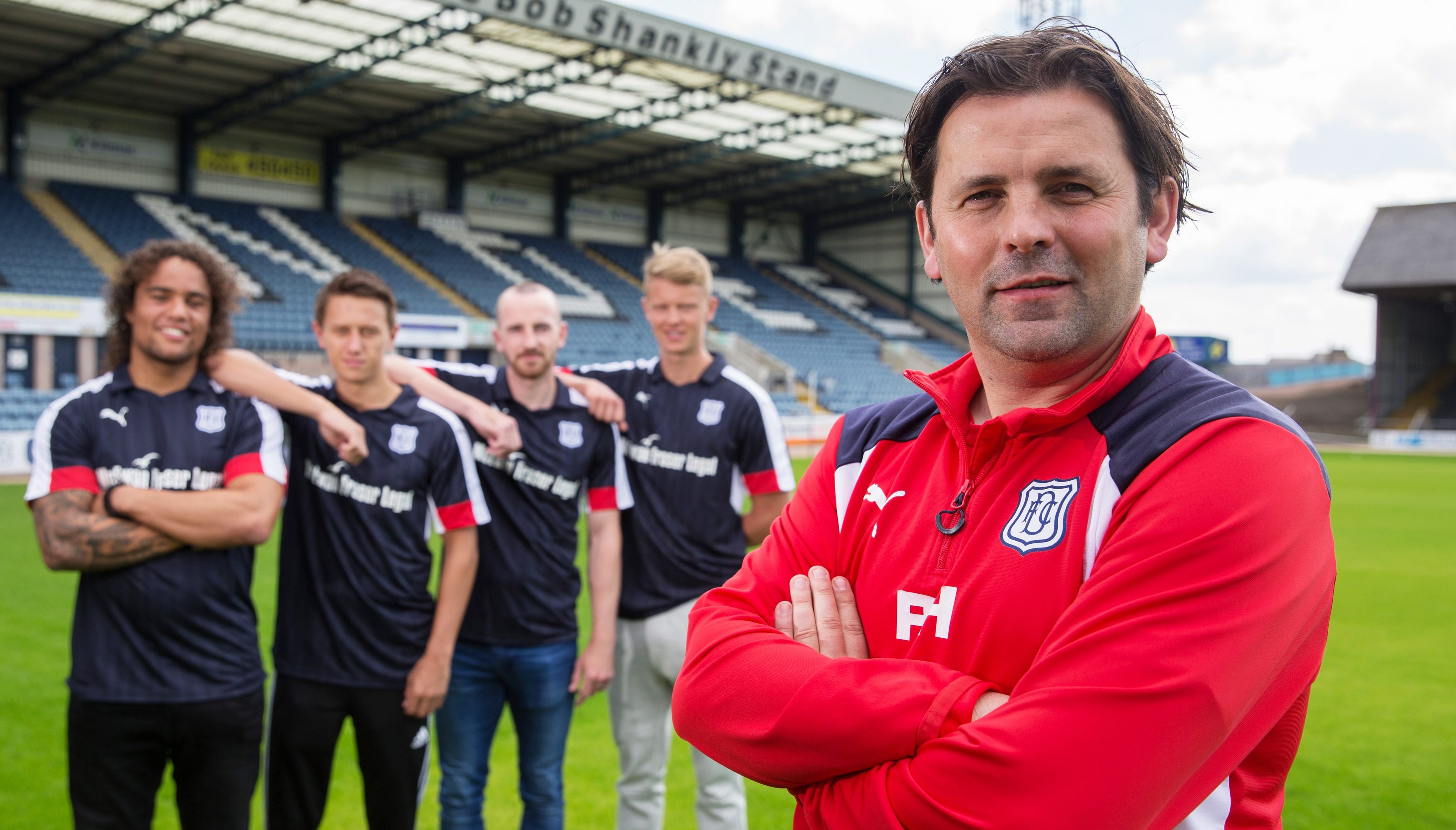 Dundee manager Paul Hartley with new signings (L-R) Yordi Teljsse, Danny Williams, James Vincent and Mark O'Hara.