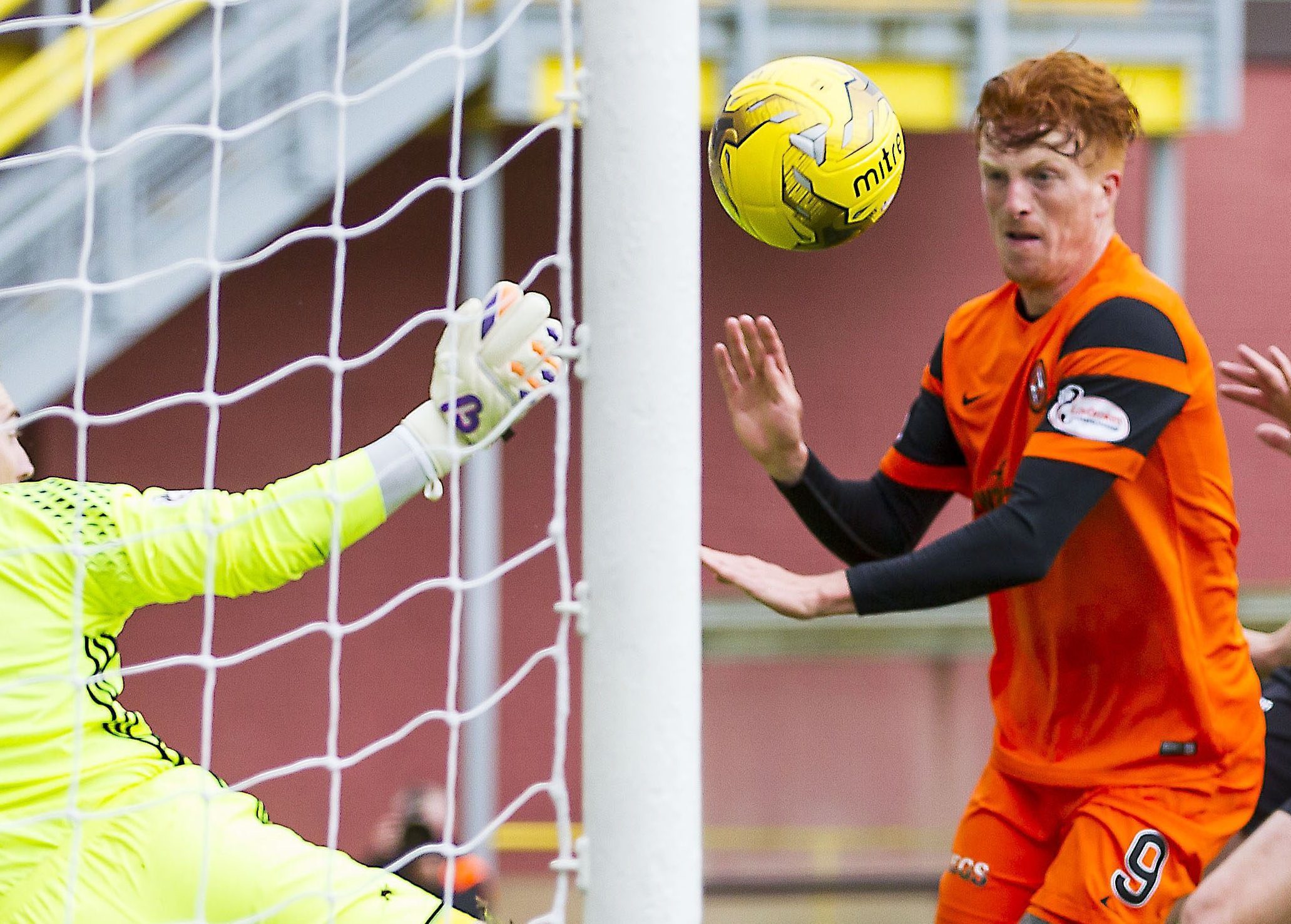 Simon Murray prepares to net the first goal for United.