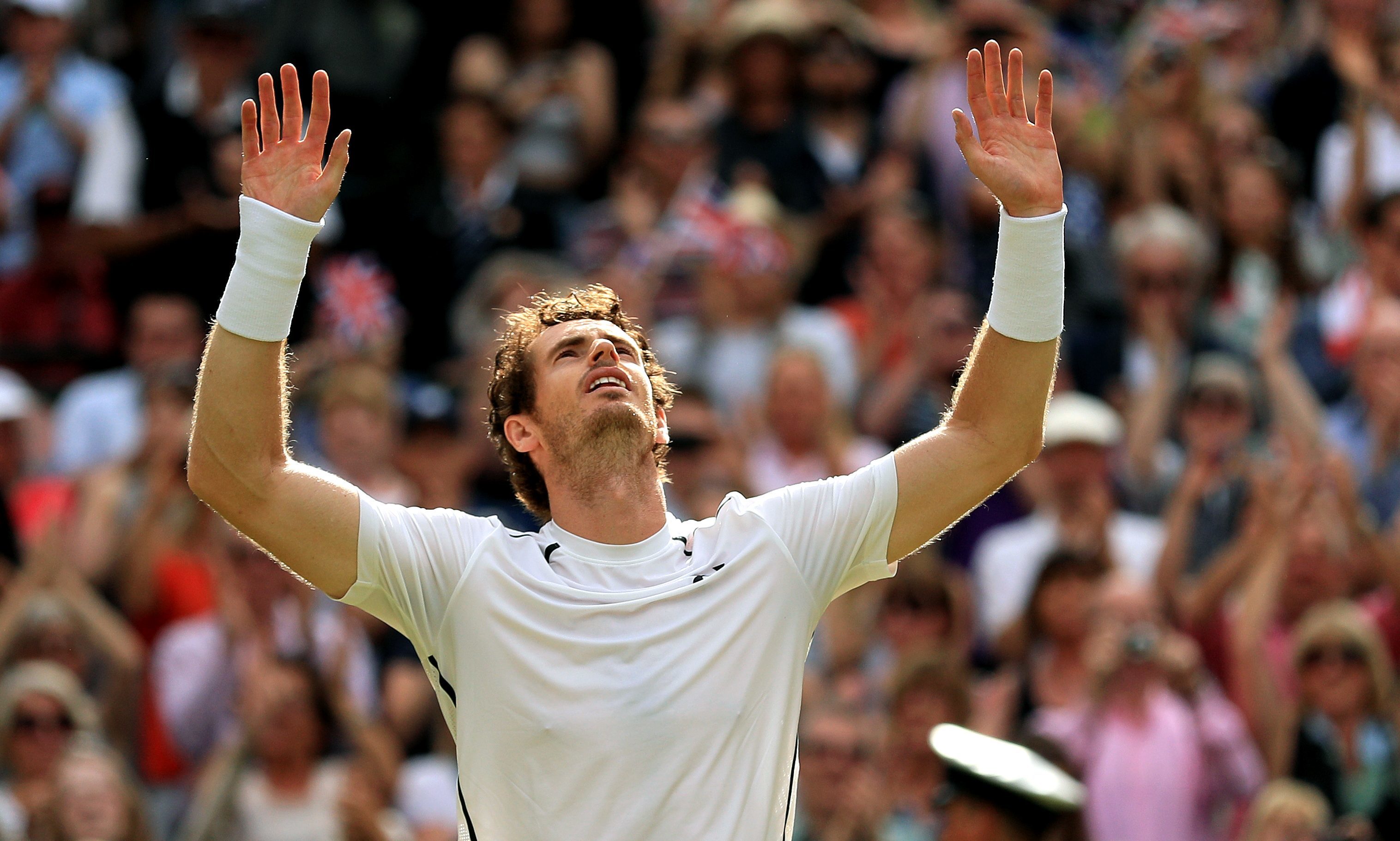 Andy Murray celebrates clinching his second Wimbledon title.