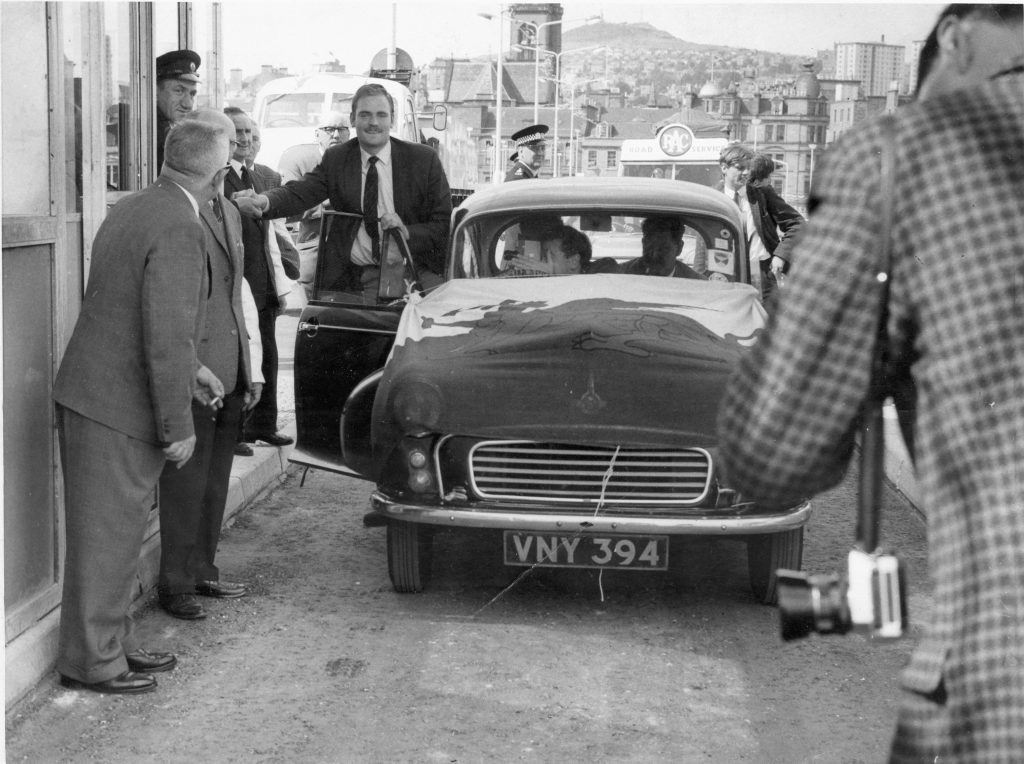 Hugh Pincott making history as the first member of the public to drive across the Tay Road Bridge when it officially opened on August 18, 1966 