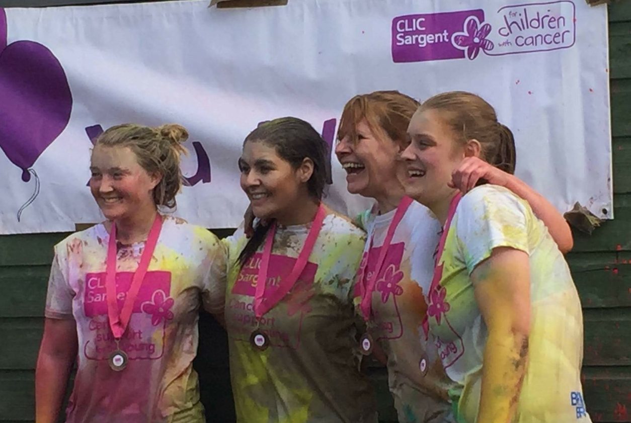 Muddy but happy! Left to right are Hazel McArthur, Chloe Kindlen, Yvonne Kindlen and Rebecca Brown.