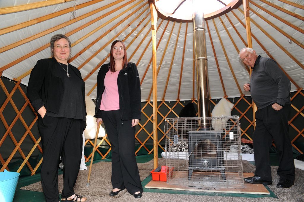 Joanna McCreadie, Suzie Williamson and Brian Fearon inside the yurt where yoga sessions are held (c) David Wardle