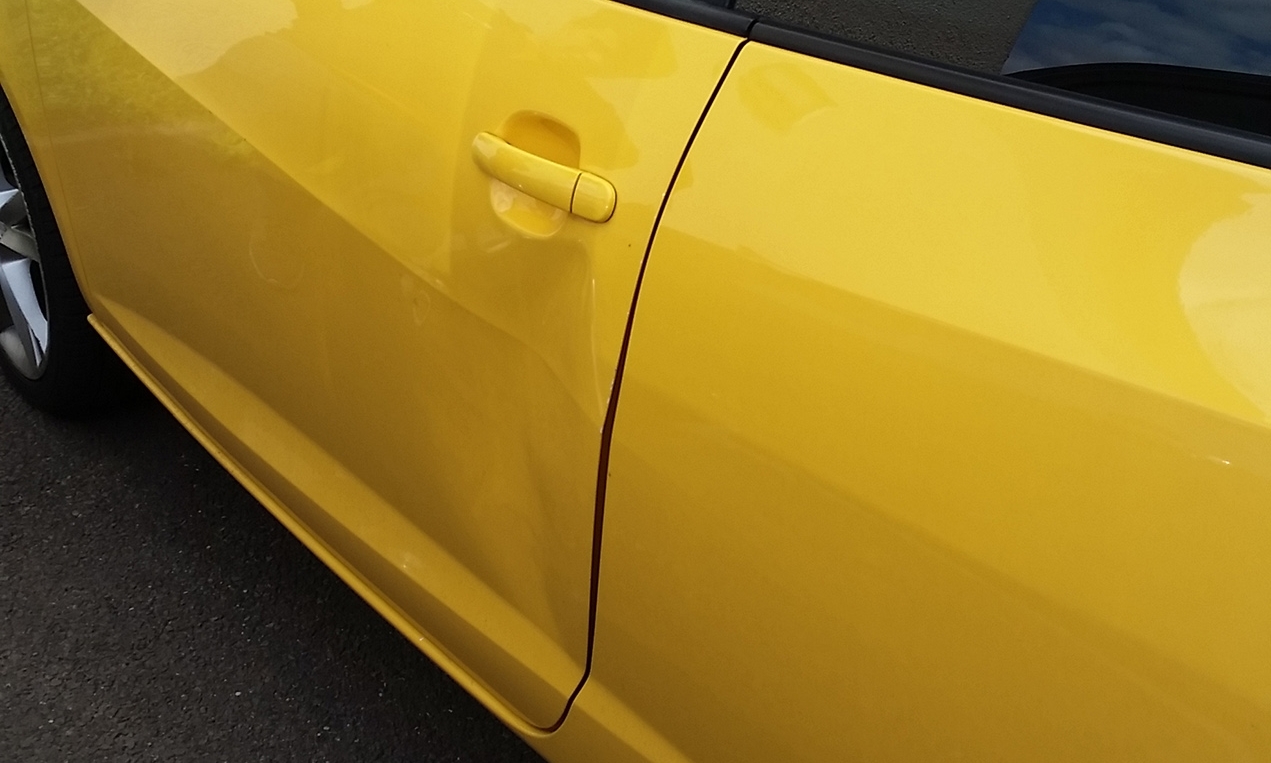 The dent left in the family's car.