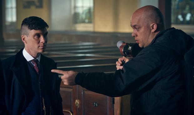 Colm McCarthy talks through a scene with Peaky Blinders star Cillian Murphy