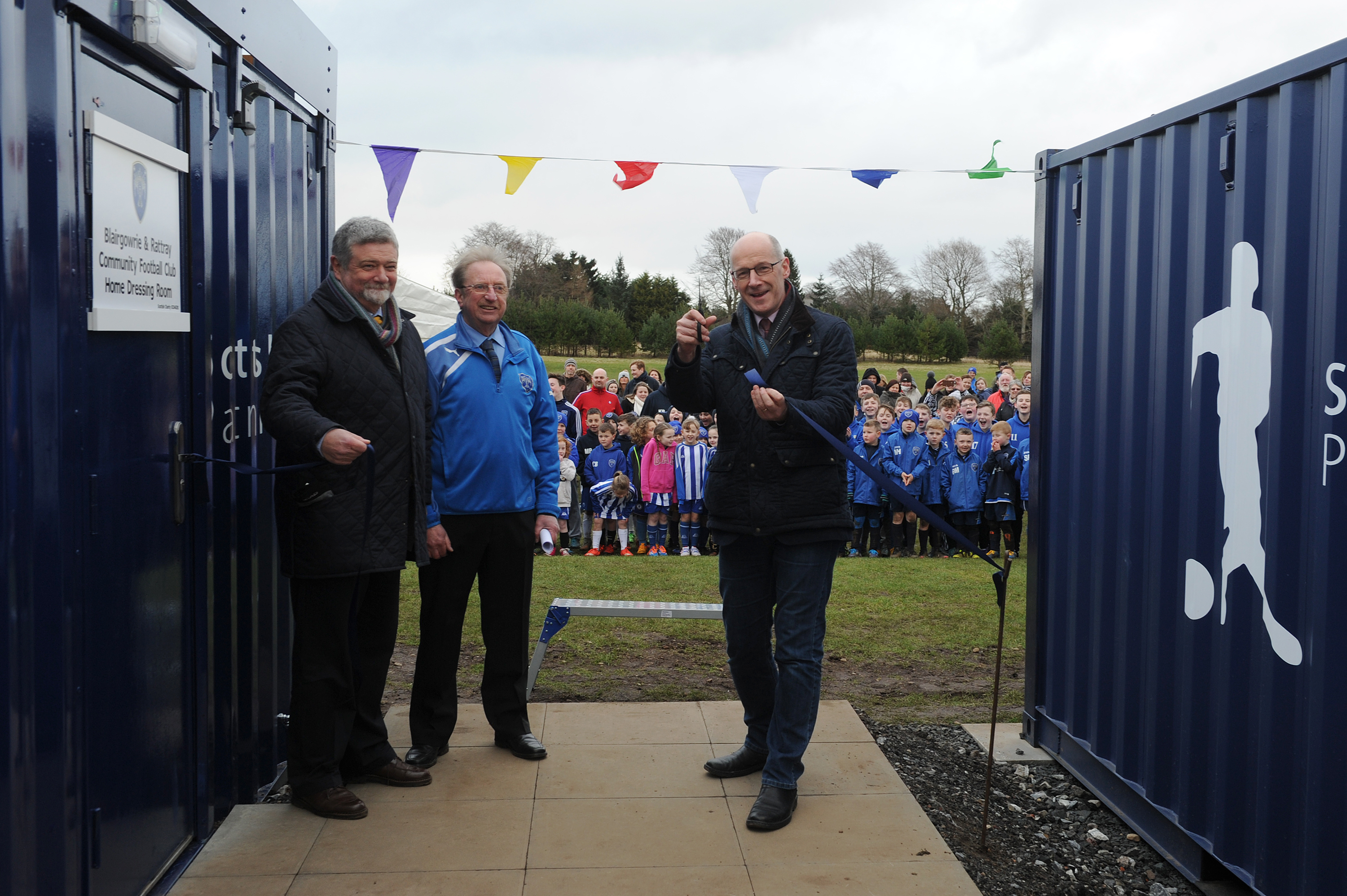 The new changing facilities, unveiled by John Swinney at the start of this year, were vandalised, leading to a decision to lock the car park.
L to r - James Clydesdale (Chair of the Scottish Football Partnership), Sandy Thomson (Chair Blairgowrie and Rattray Community FC) and John Swinney.