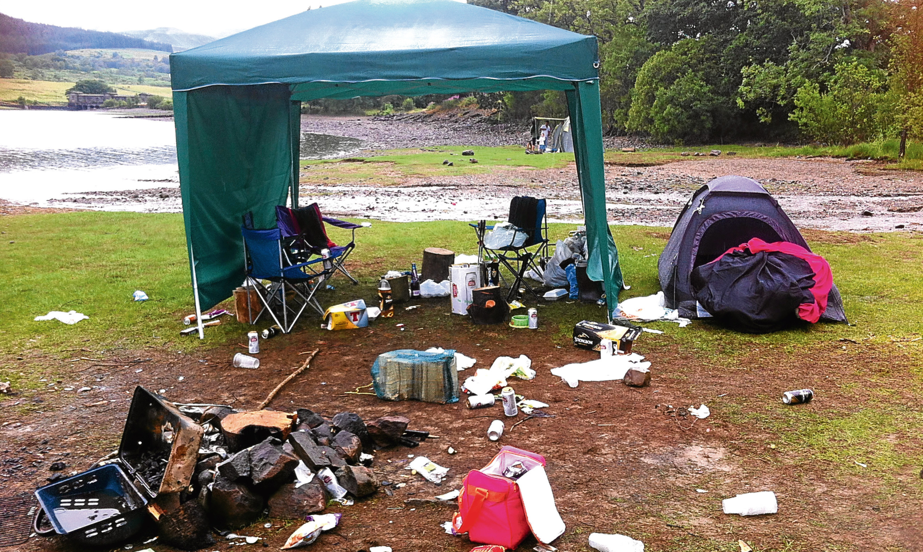 Mess left on a Scottish lochside by inconsiderate campers.