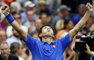 Kei Nishikori of Japan celebrates after defeating Andy Murray.