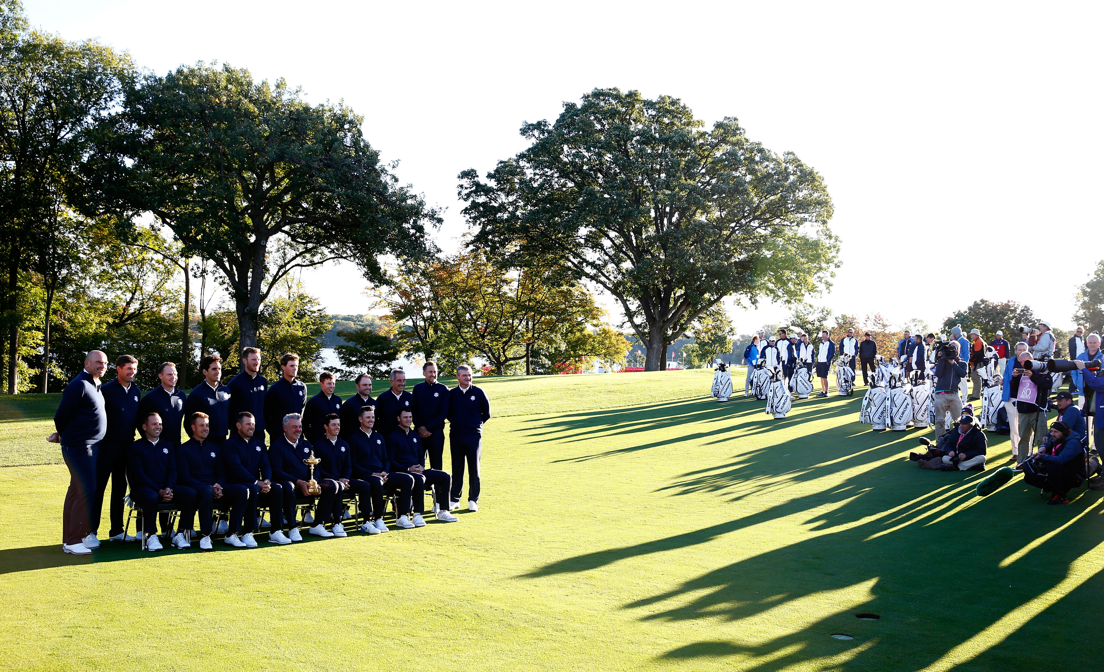 Darren Clarke and his European team satnd (and sit) shoulder to shoulder at Hazeltine yesterday.