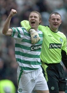 Rab celebrates an Old Firm win with defender Ulrik Laursen.