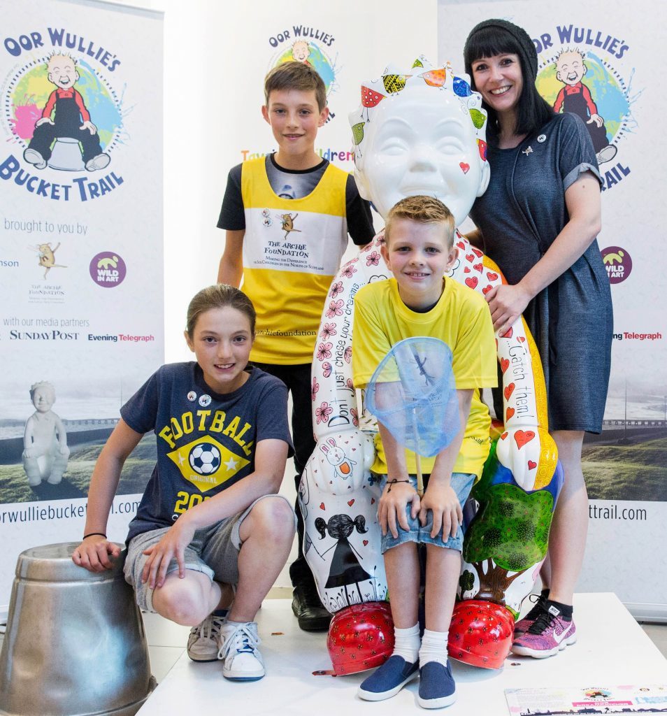 Artist Suzanne Scott created Oor Dreamcatcher with help from her "Dream Team", among them Charlotte Taylor (11), Alfie Taylor (12), Brandyn Bowie (9) 