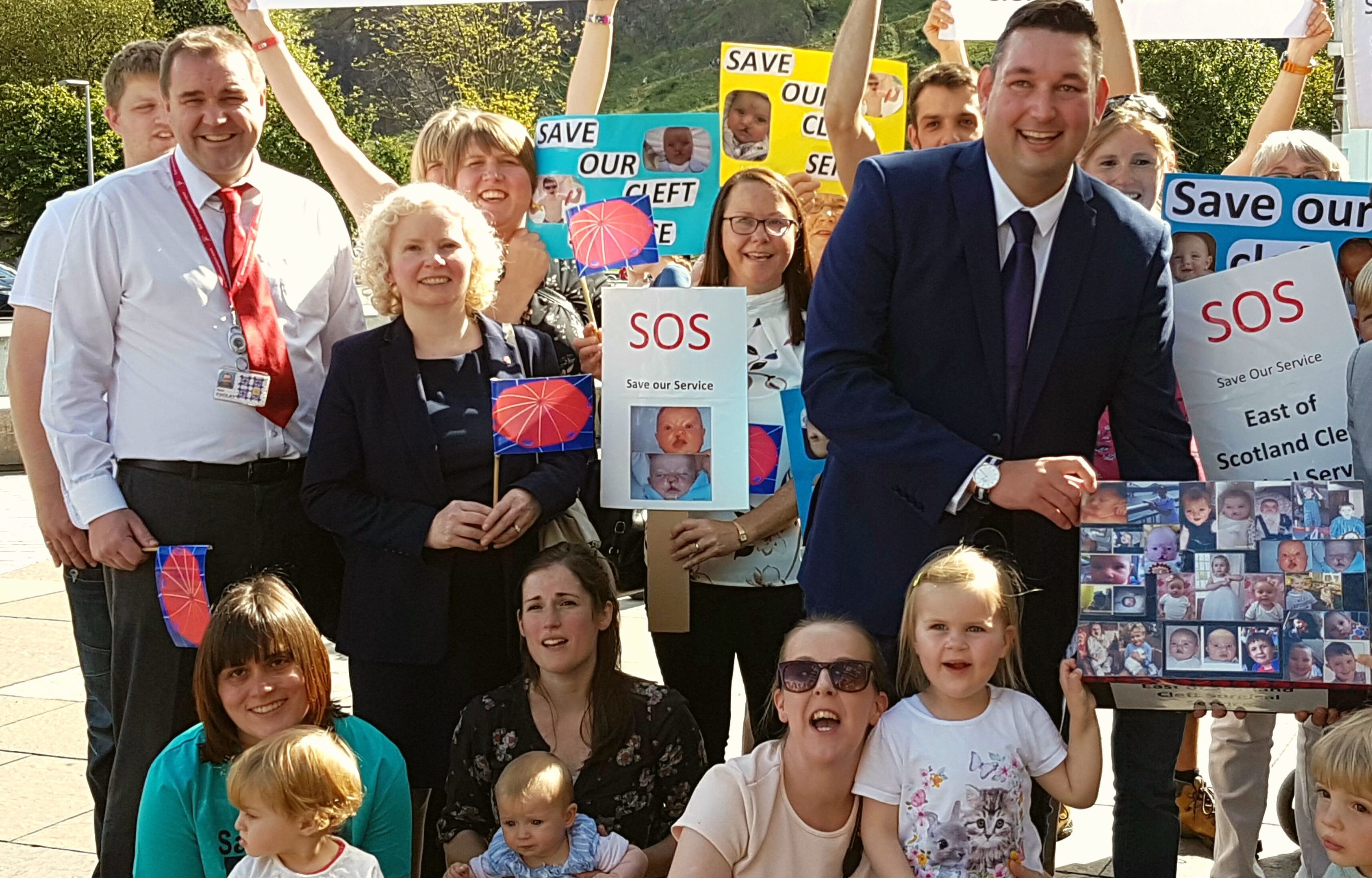 Claire Baker MSP centre left) with protesters