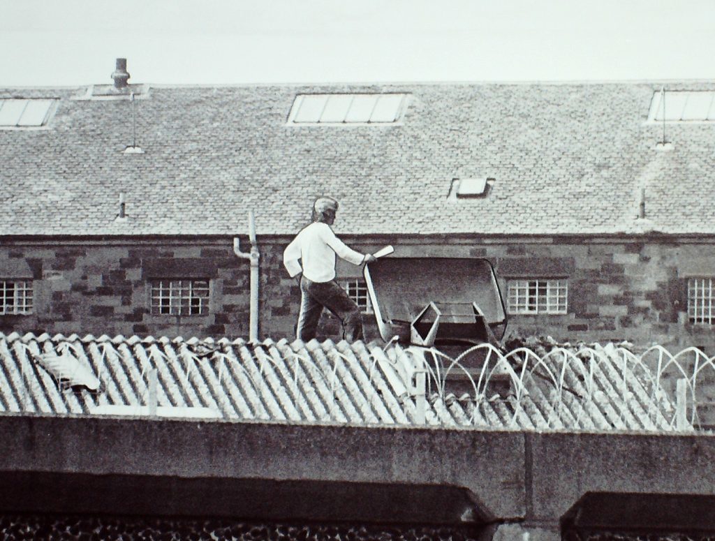 Robert Mone stages a rooftop protest at Perth Prison in 1981.