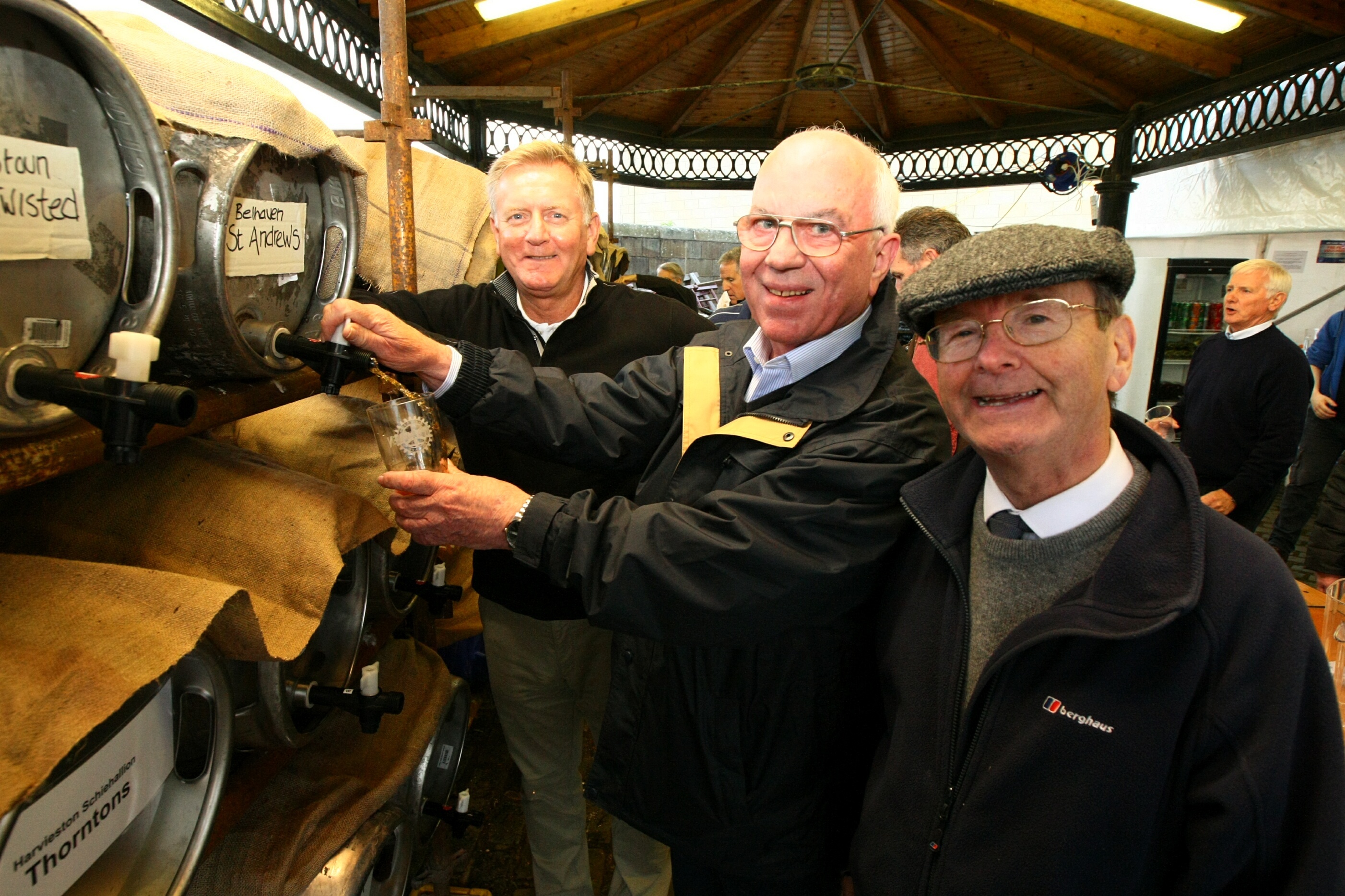 Robert Dundee, Dundee Rotary Club president Peter Leyland and Jonathan Stewart sample the beers.