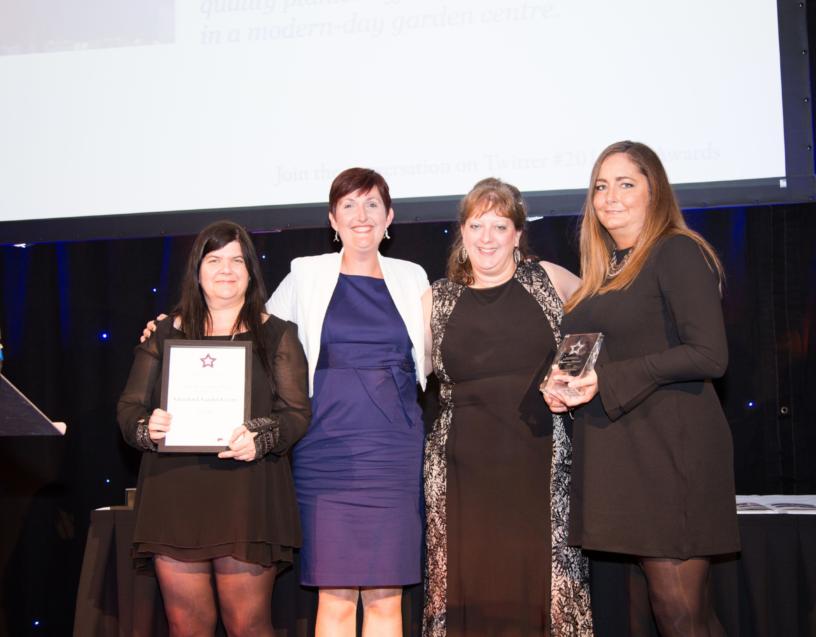 Glendoick's Annie Kane, Heather Borderie and Rachel Hardy with judge Laura Peacock (second from left).